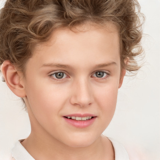 Joyful white child female with short  brown hair and brown eyes