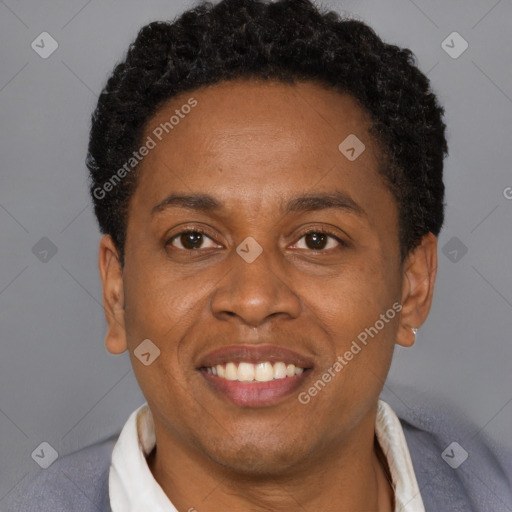 Joyful latino young-adult male with short  brown hair and brown eyes