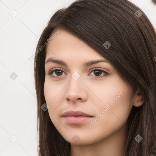 Neutral white young-adult female with long  brown hair and brown eyes