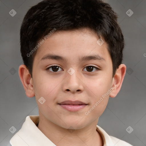 Joyful white child male with short  brown hair and brown eyes