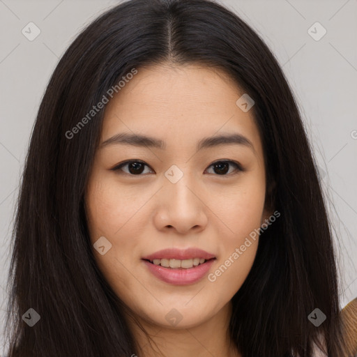 Joyful asian young-adult female with long  brown hair and brown eyes