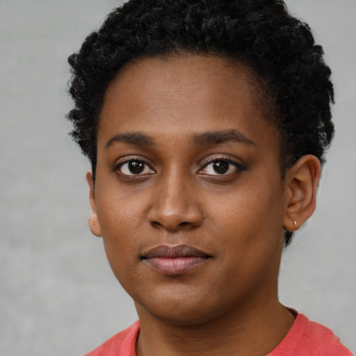 Neutral black young-adult female with short  black hair and brown eyes
