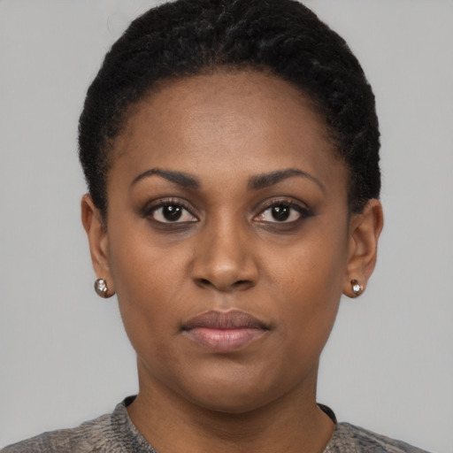 Neutral black young-adult female with short  brown hair and brown eyes