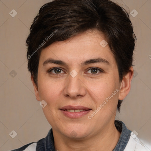 Joyful white adult female with short  brown hair and brown eyes