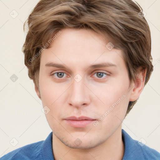 Neutral white young-adult male with short  brown hair and blue eyes