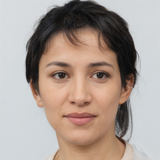 Joyful white young-adult female with medium  brown hair and brown eyes