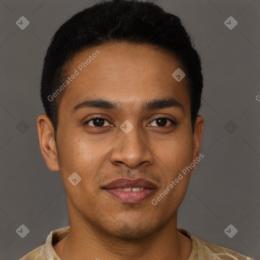 Joyful black young-adult male with short  brown hair and brown eyes
