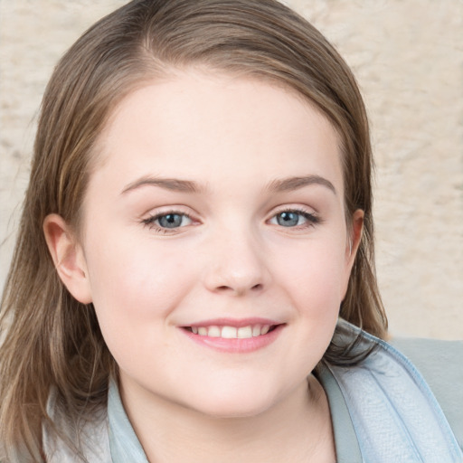 Joyful white child female with medium  brown hair and grey eyes