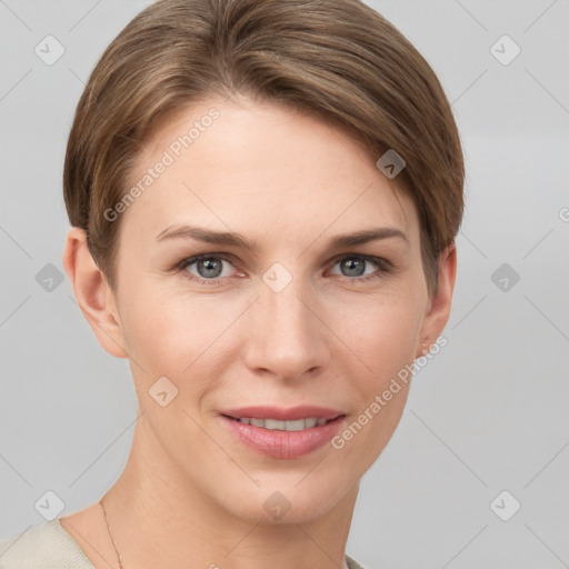 Joyful white young-adult female with short  brown hair and grey eyes