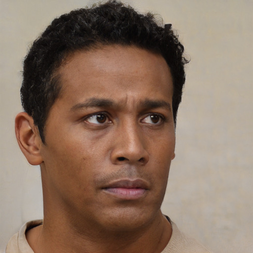 Neutral black young-adult male with short  brown hair and brown eyes