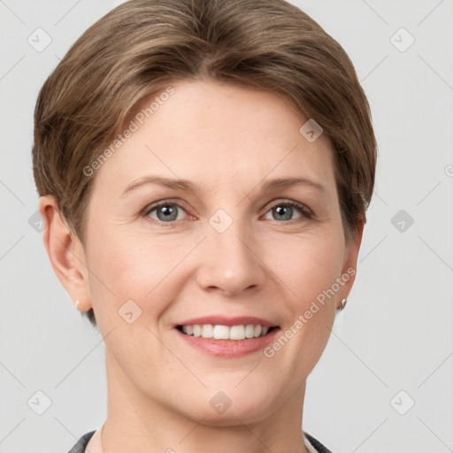 Joyful white young-adult female with short  brown hair and grey eyes