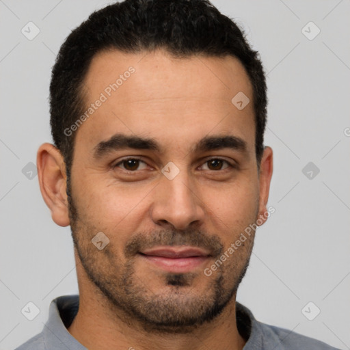 Joyful white young-adult male with short  black hair and brown eyes