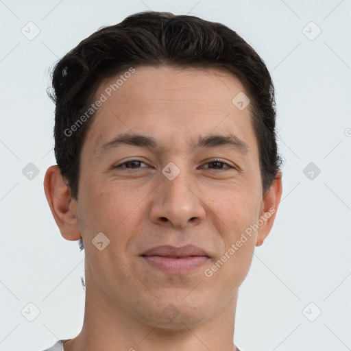 Joyful white adult male with short  brown hair and brown eyes