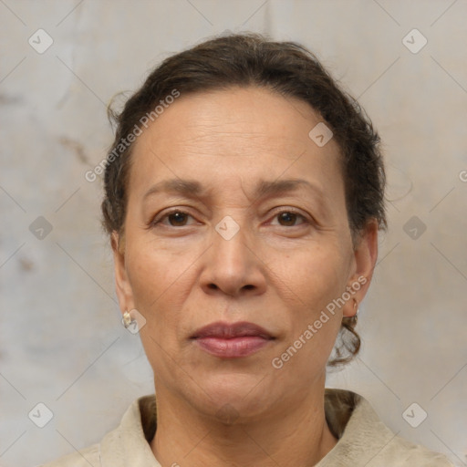 Joyful white adult female with short  brown hair and brown eyes