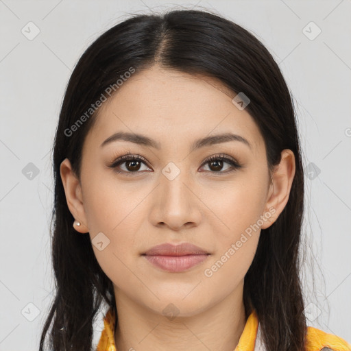 Joyful latino young-adult female with long  brown hair and brown eyes