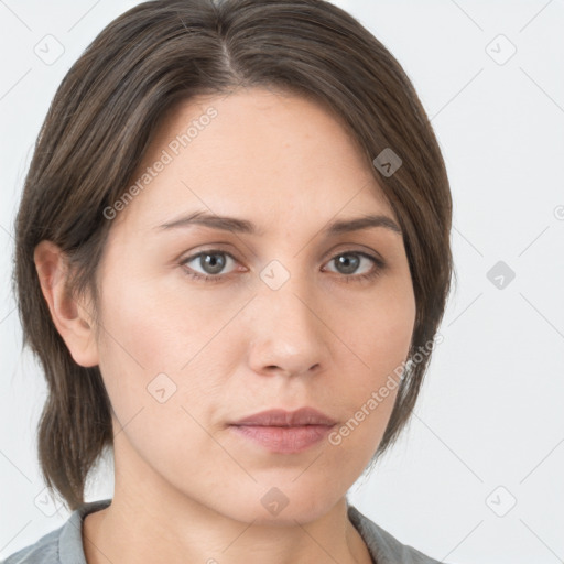 Neutral white young-adult female with medium  brown hair and grey eyes