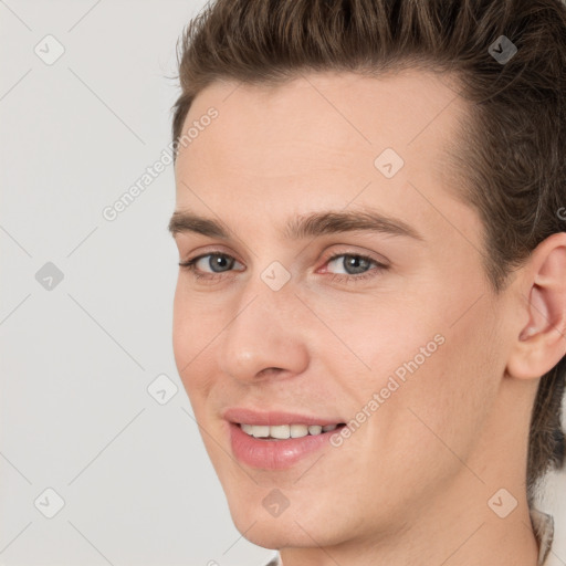 Joyful white young-adult male with medium  brown hair and brown eyes