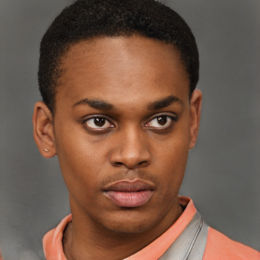 Neutral latino young-adult male with short  brown hair and brown eyes