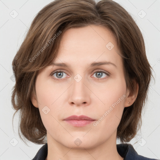 Neutral white young-adult female with medium  brown hair and grey eyes