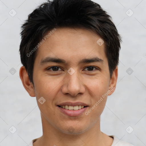 Joyful white young-adult male with short  black hair and brown eyes