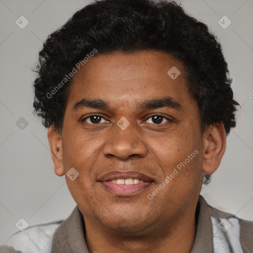 Joyful latino young-adult male with short  brown hair and brown eyes