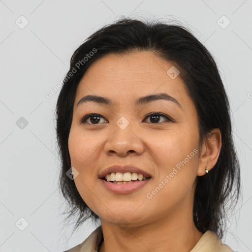 Joyful asian young-adult female with medium  brown hair and brown eyes