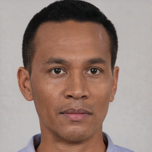 Neutral black young-adult male with short  black hair and brown eyes