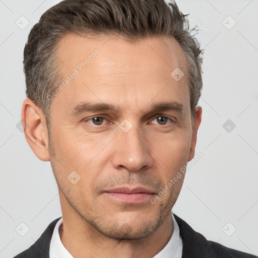 Neutral white adult male with short  brown hair and brown eyes