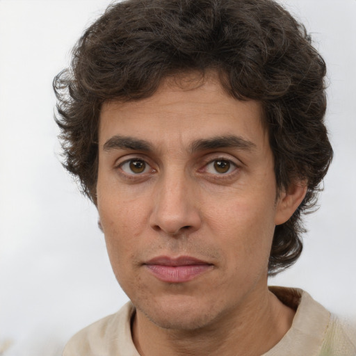 Neutral white adult male with short  brown hair and brown eyes