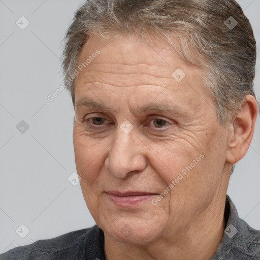 Joyful white middle-aged male with short  brown hair and brown eyes