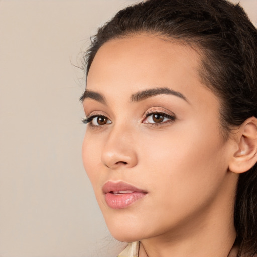 Neutral white young-adult female with long  brown hair and brown eyes