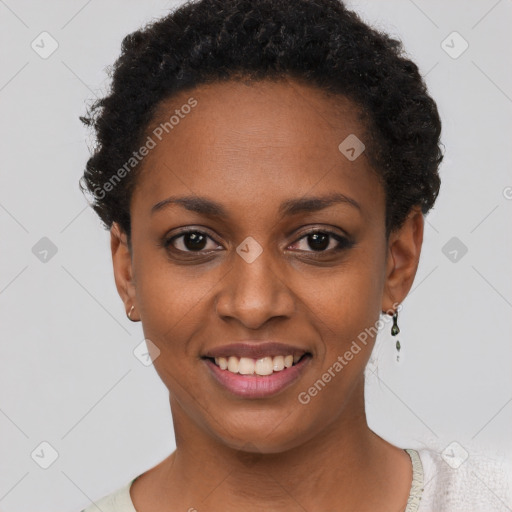 Joyful black young-adult female with short  black hair and brown eyes