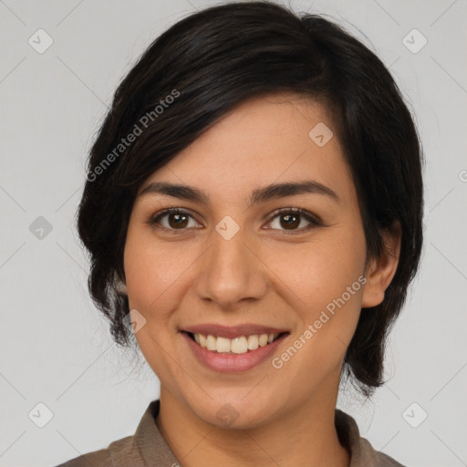 Joyful white young-adult female with medium  black hair and brown eyes