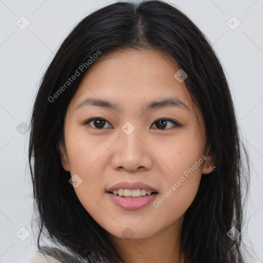 Joyful asian young-adult female with long  brown hair and brown eyes