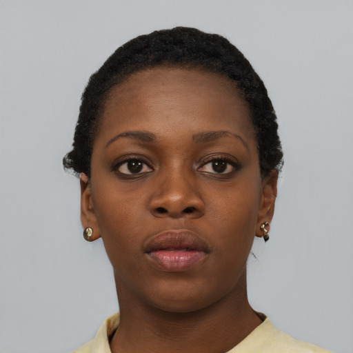Neutral black young-adult female with short  black hair and brown eyes