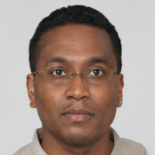 Neutral black young-adult male with short  brown hair and brown eyes