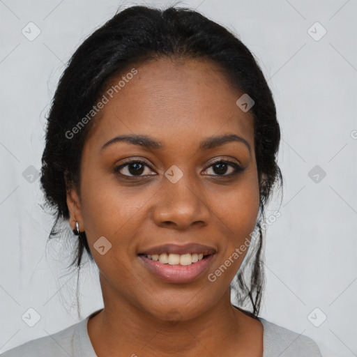 Joyful black young-adult female with medium  black hair and brown eyes