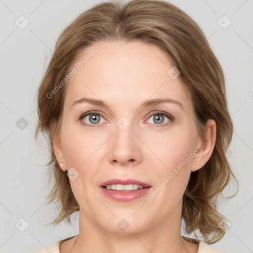 Joyful white young-adult female with medium  brown hair and blue eyes