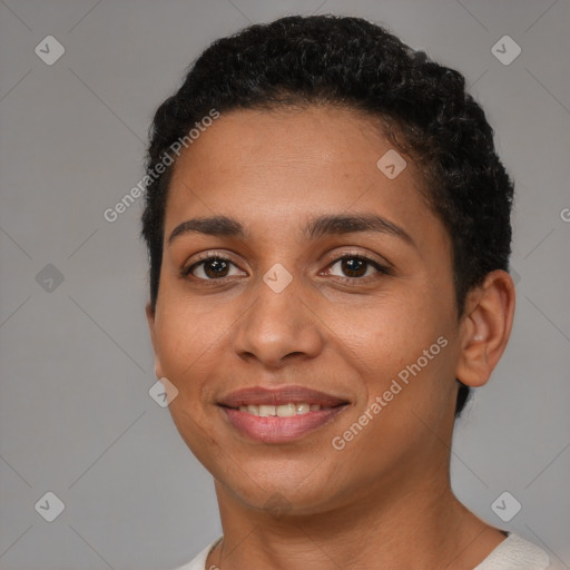 Joyful latino young-adult female with short  brown hair and brown eyes