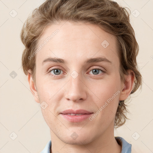 Joyful white young-adult female with medium  brown hair and blue eyes