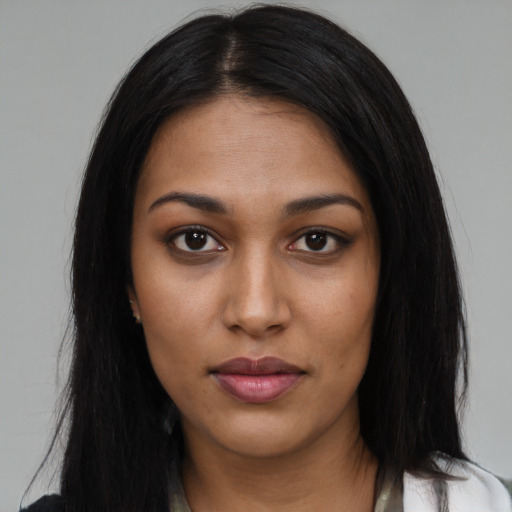 Neutral black young-adult female with long  black hair and brown eyes