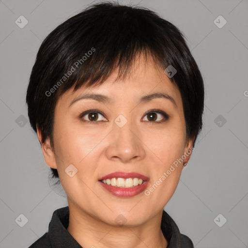 Joyful asian young-adult female with short  brown hair and brown eyes