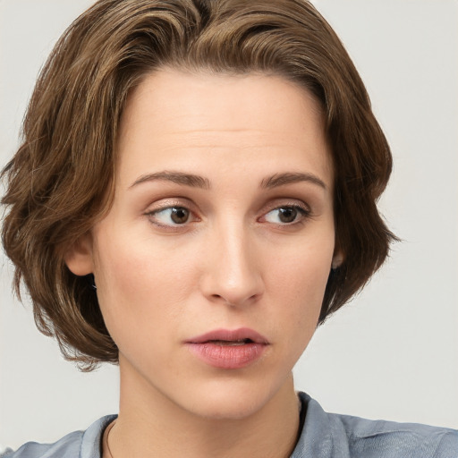 Neutral white young-adult female with medium  brown hair and grey eyes