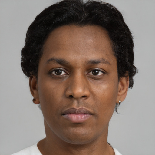 Neutral black young-adult female with short  brown hair and brown eyes