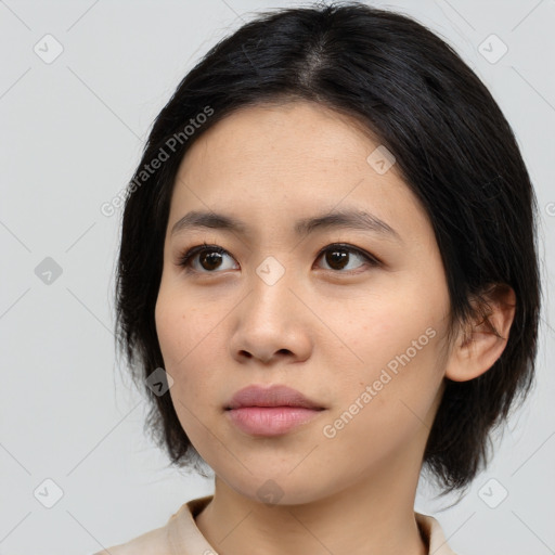 Neutral asian young-adult female with medium  black hair and brown eyes