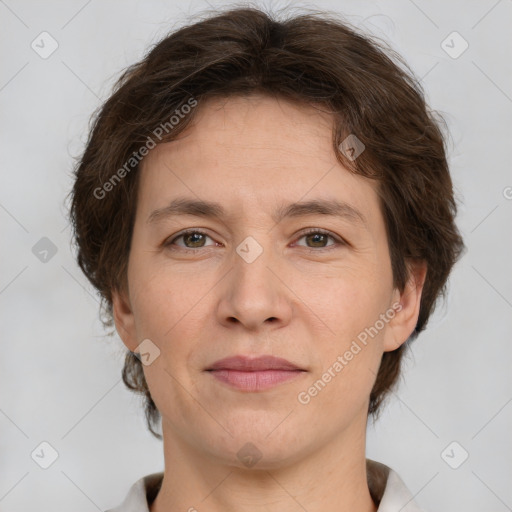 Joyful white adult male with short  brown hair and grey eyes