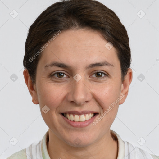 Joyful white young-adult female with short  brown hair and grey eyes