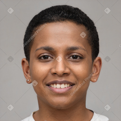 Joyful black young-adult female with short  black hair and brown eyes