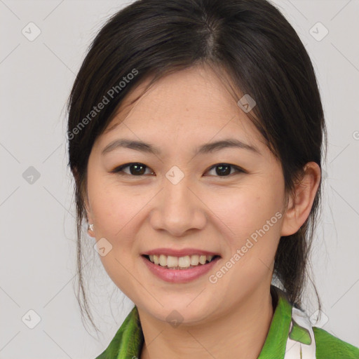 Joyful white young-adult female with medium  brown hair and brown eyes