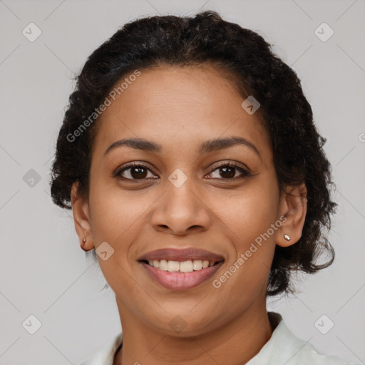 Joyful latino young-adult female with short  brown hair and brown eyes